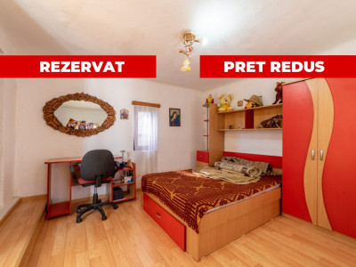 Casă spațioasă cu livadă și anexe, la 20 km de Pitești – 1810 mp teren