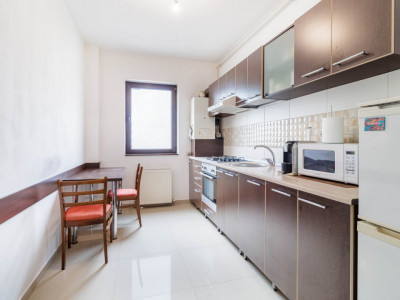 Apartament 2 camere, decomandat, parter înalt – cu curte, balcon și acces auto
