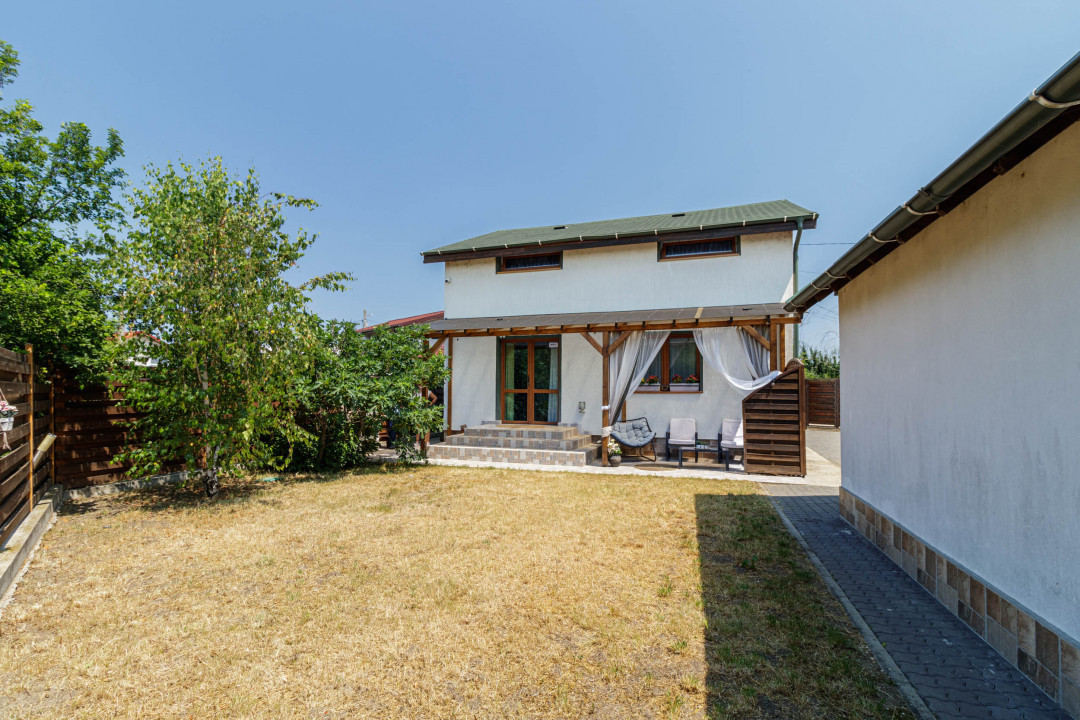 Casa luminoasa cu gradina si garaj 