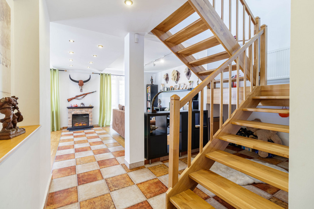 Casa luminoasa cu gradina si garaj 