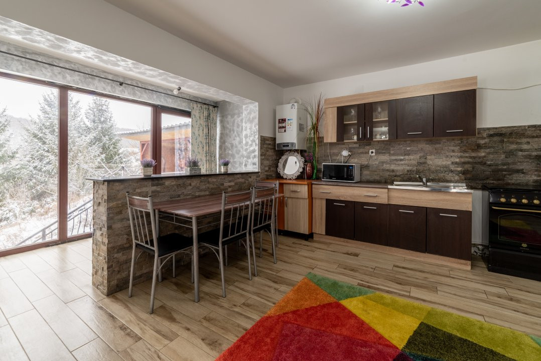 Casa primitoare de închiriat in Valea Ursului-spațiu, natura si liniște