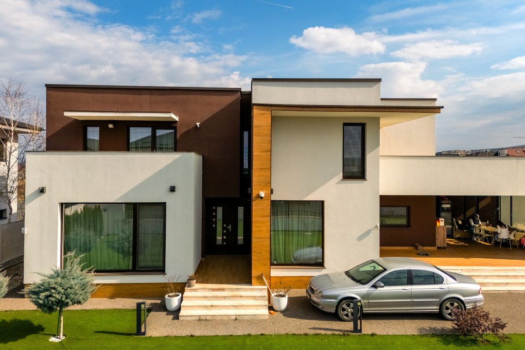 Vila moderna Mioveni | teren 1231 mp | terase, foisor si garaj