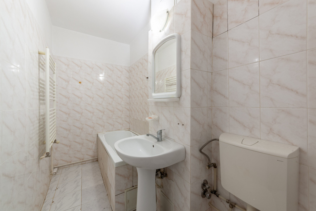 Apartament Topoloveni - 3 camere, decomandat, parter 