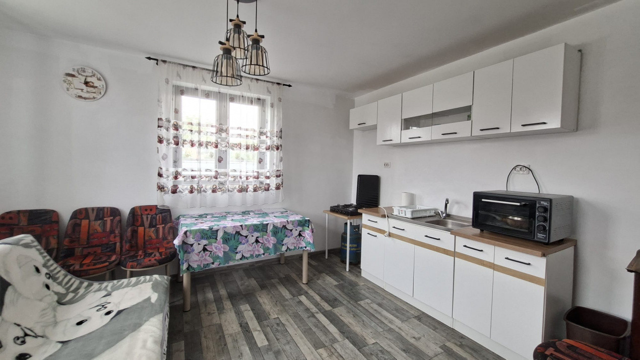 Casă complet renovată RATESTI, Tigveni – Argeș cu teren 1746 mp